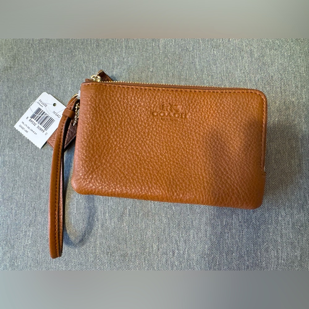 Coach wristlet with tags